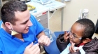 Entire dental school clinic devoted to free dental care for KC area children on 'Give Kids A Smile' Day