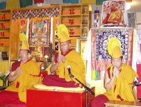 Tibetan monks from the Drepung Gomang Monastic College meditate.