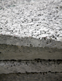 Test slabs of pervious concrete illustrate a more textured appearance than standard concrete.