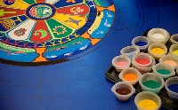 Tibetan monks from the Drepung Gomang Monastic College used dyed sand particles to create a sand mandala.