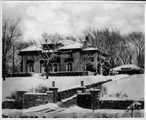 Front of Tureman House -- A.K.A. the Toy and Miniature Museum, UMKC Campus.  Snow covering house and front lawn.