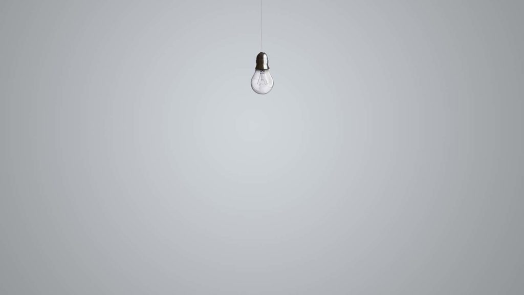 a lightbulb hanging from a wire