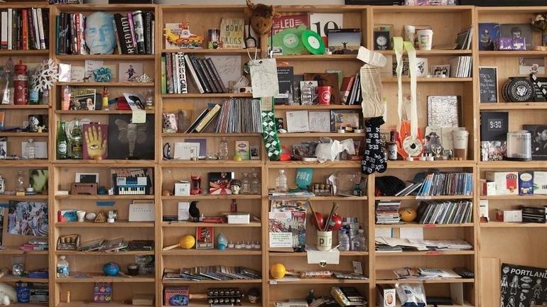 bookshelf with music instruments and sound effects