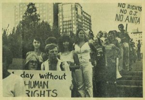 A newspaper photo shows a Kansas City protest march against anti-gay rights activist Anita Bryant.