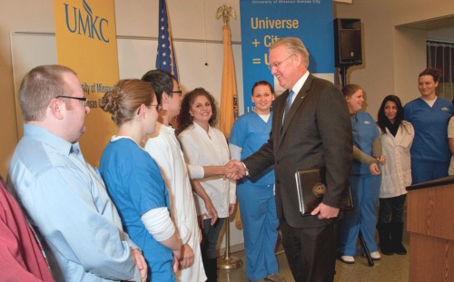 Missouri Governor Jay Nixon greets UMKC School of Nursing students before Tuesday's news conference.