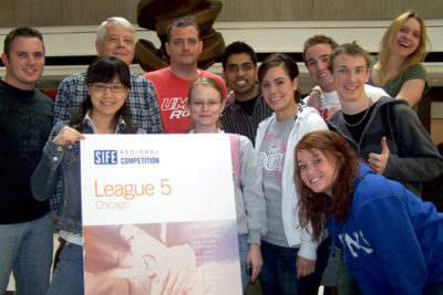 The SIFE team celebrates their win in Chicago. Back row, from left, Roger Moore, Cary Clark, Jason Patterson, Muhammed Haider, Austin Hunt and Kaitlin Claren. Front row, from left, Mi Zhao, Jeanette Glaze, Beth Larson, Vaughn English and Tara Nigh.
