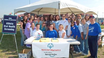 Providing free dental screenings to Special Olympics athletes is just one of the many ways UMKC School of Dentistry students and faculty give back.