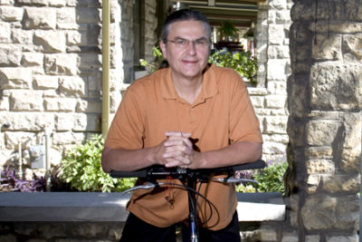 Professor Robert Prue enjoys riding his bicycle to campus. Prue joined the University of Missouri-Kansas City School of Social work in July.